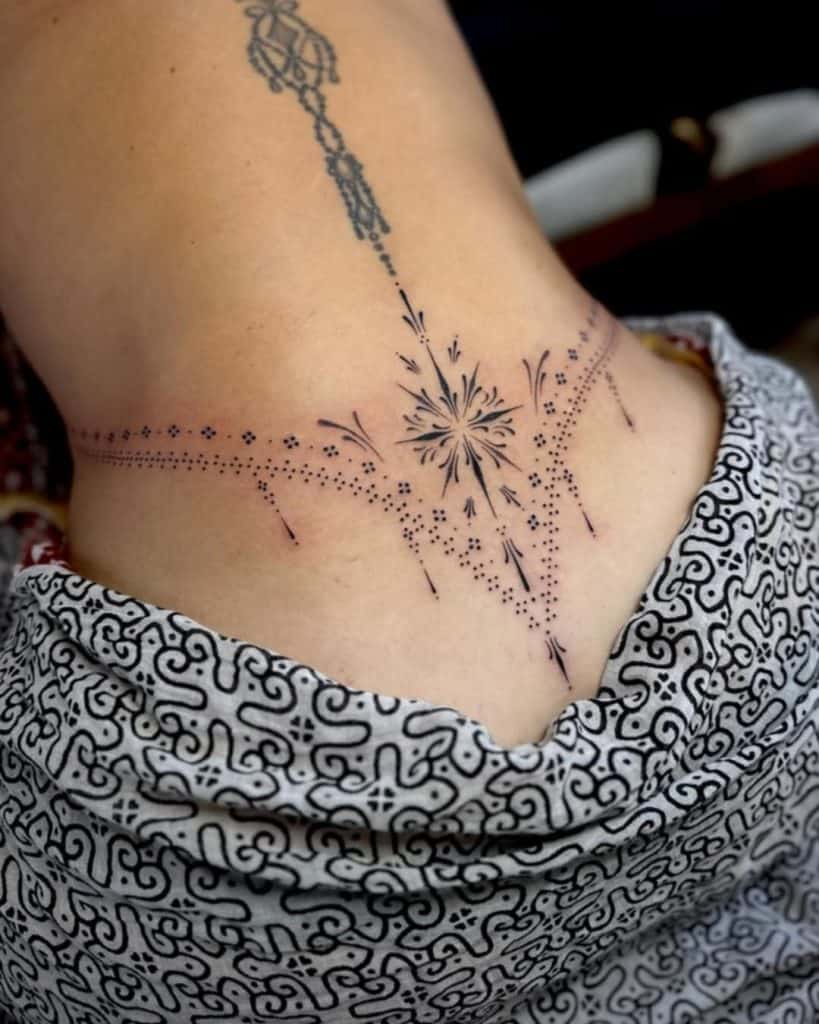 A Woman Amp 39 S Lower Back Tattoo With Birds In The Shape Of A Heart On Her