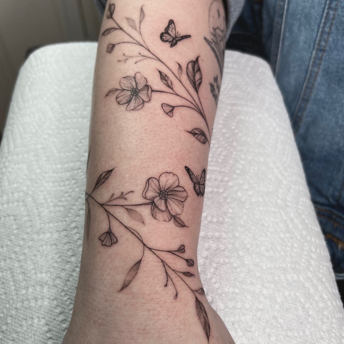 Delicate Floral Vine Tattoo