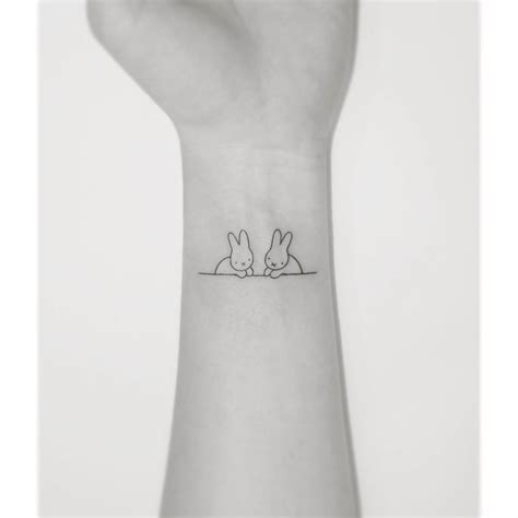 Fine Line Rabbit Tattoo Located On The Wrist Fine Line Rabbit Tattoo Located On The Wrist