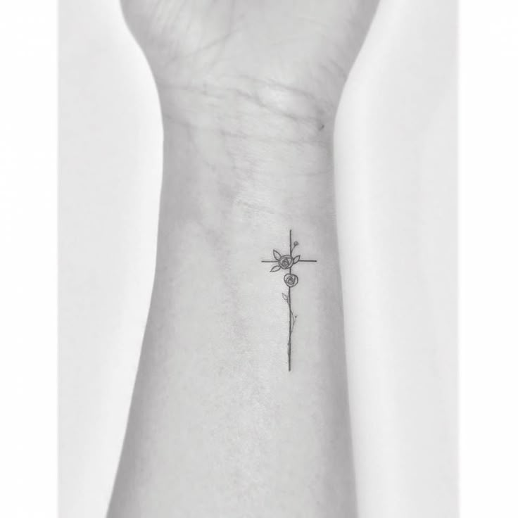 Fine Line Style Flower Cross Tattoo Located On The Fine Line Style Flower Cross Tattoo Located On The