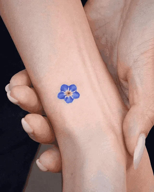What Does A Flower Hand Tattoo Say About Your Style?