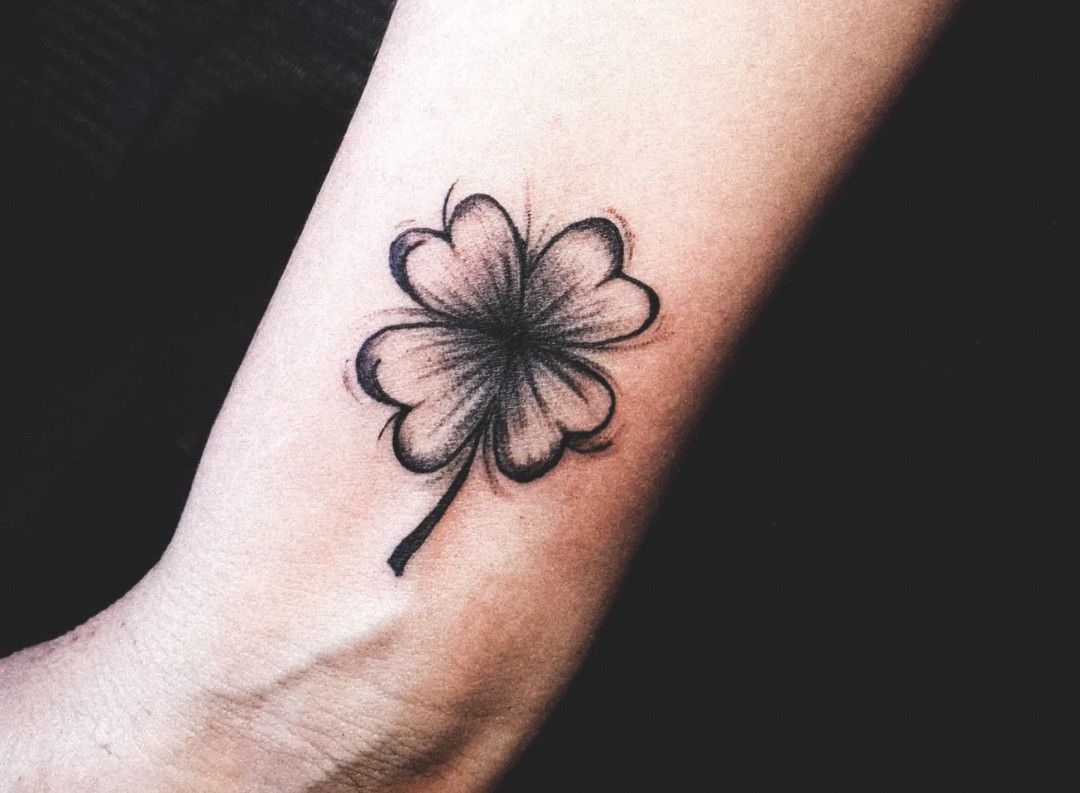 Minimalistic Four Leaf Clover Tattoo On The Wrist Minimalistic Four Leaf Clover Tattoo On The Wrist