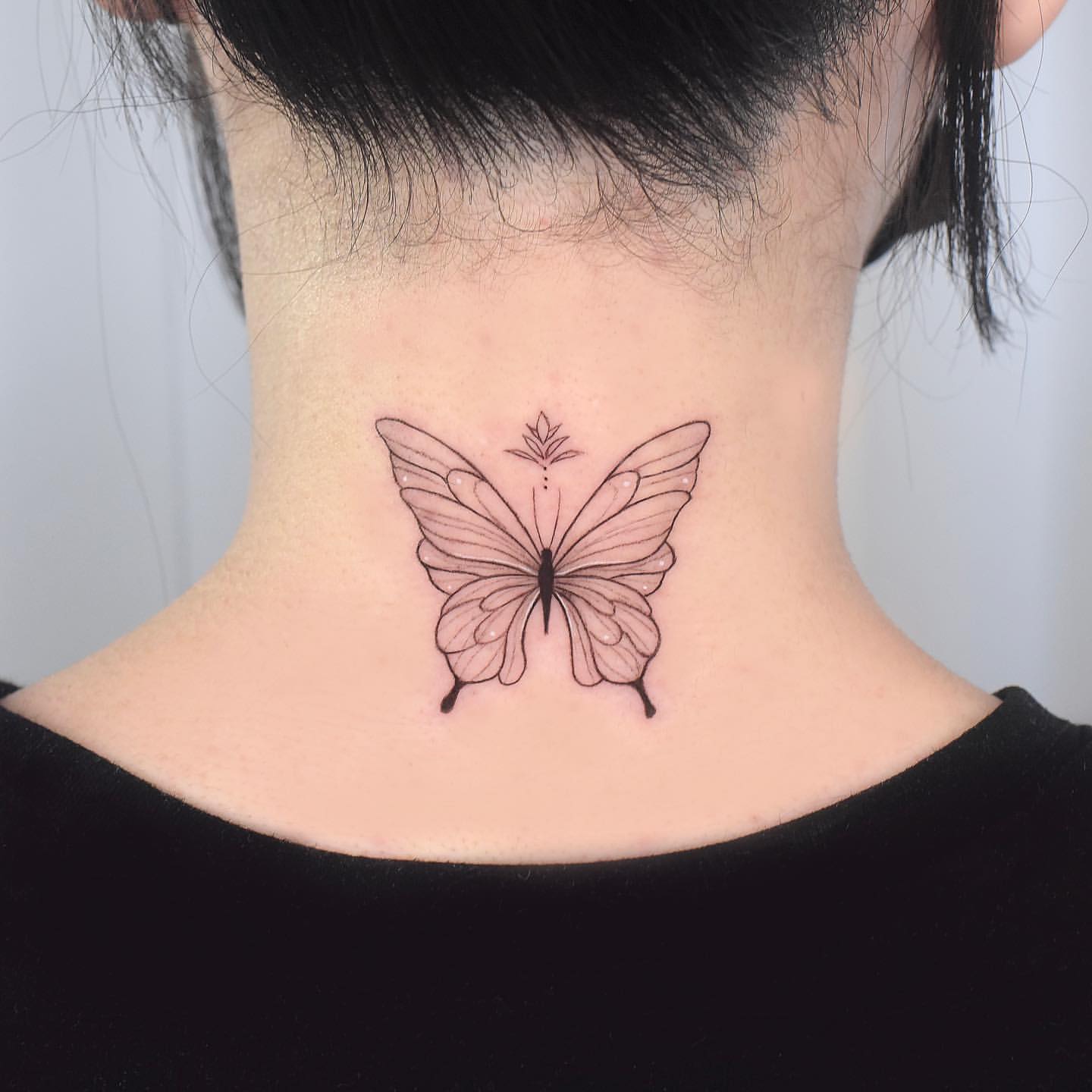 Neck Butterfly Tattoo