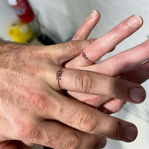 Wedding Band Tattoos With Names Intriguing Wedding Ring Tattoo Ideas Wedding Band Tattoos With Names Intriguing Wedding Ring Tattoo Ideas