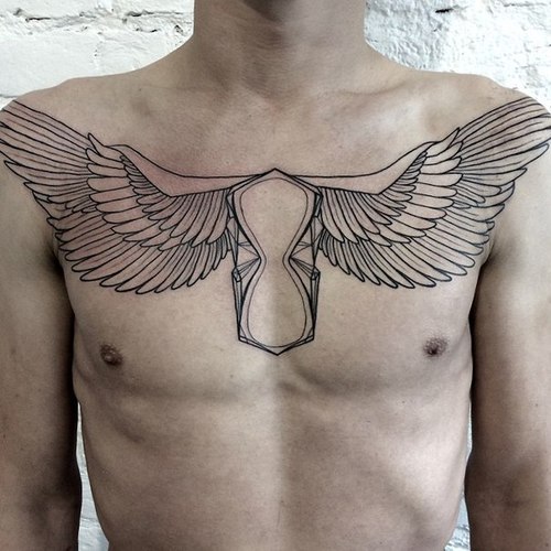 Wings Chest Tattoo